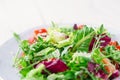 Fresh organic super food salad on white plate with fork on side Royalty Free Stock Photo