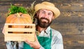 Fresh organic vegetables box. Farmer straw hat deliver fresh vegetables. Fresh vegetables delivery service. Man cheerful Royalty Free Stock Photo