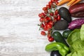 Fresh organic vegetables on white wood background. Healthy natural food on table with copy space Royalty Free Stock Photo