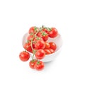 Fresh organic wet cherry tomatoes bunch on ceramic bowl Royalty Free Stock Photo