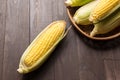 Fresh organic yellow sweet corn on wooden table Royalty Free Stock Photo