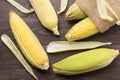 Fresh organic yellow sweet corn on wooden table. Top view Royalty Free Stock Photo