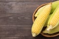 Fresh organic yellow sweet corn on wooden table. Top view Royalty Free Stock Photo