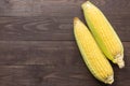 Fresh organic yellow sweet corn on wooden table. Top view Royalty Free Stock Photo