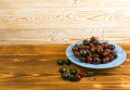 Fresh Overripe ripe Cherries on Blue Rustic Wooden Background Royalty Free Stock Photo