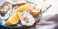 Fresh Oysters closeup, served with oysters, lemon and ice. Healthy seafood. Oyster dinner in restaurant Royalty Free Stock Photo