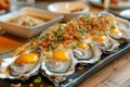 Fresh Oysters with Quail Eggs and Crispy Fried Shallots on a Wooden Serving Tray in a Casual Dining Setting