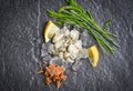 Fresh oysters served on dark plate and ice - Oyster Salad with vegetable lemon and herb in the seafood restaurant Royalty Free Stock Photo