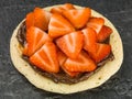 Fresh Pancake With Sliced Ripe Juicy Strawberries and Chocolate Spread Royalty Free Stock Photo