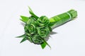 Fresh Pandanus leaf weave to rose bouquet