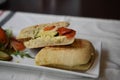 Fresh panini bread with mozzarella and roasted vegetables in a sandwich Royalty Free Stock Photo