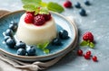 Fresh Panna Cotta with Berries on a Rustic Table Setting