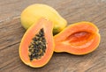 Fresh papaya on wooden board Royalty Free Stock Photo