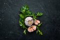 Fresh parsley and garlic on a dark background. Vegetables. Top view. Royalty Free Stock Photo