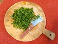 Fresh parsley leaves on a round wooden board Royalty Free Stock Photo