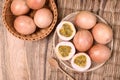 Fresh passion fruit in a basket with spoon on wooden background Royalty Free Stock Photo