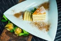 Fresh passion fruit cake with coconut and cinnamon. Dessert on plate. The restaurant or cafe atmosphere Royalty Free Stock Photo