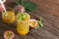 Fresh passion fruit with mint and soda water in glass, detox water, healthy drink Royalty Free Stock Photo