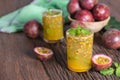 Fresh passion fruit with mint and soda water in glass, detox water, healthy drink