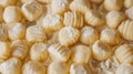 Fresh pasta and flour dusting on a wooden board. Italian cooking and food preparation concept