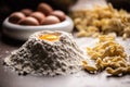 Fresh pasta recipe with flour, egg yolk and a twisted shaped pasta pieces Royalty Free Stock Photo