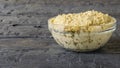 Fresh pasta tahini from sesame seeds with olive oil and lemon juice on black wooden table. Royalty Free Stock Photo