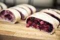 Fresh pastries - charlotte with cherries, apples and nuts, arranged in a row