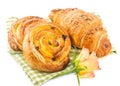 Fresh pastry and croissant isolated over white background Royalty Free Stock Photo