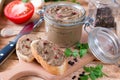 Fresh pate with bread on wooden table