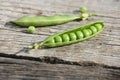 Fresh pea pods onwooden boards Royalty Free Stock Photo