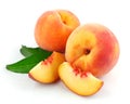 Fresh peach fruits with green leaves Royalty Free Stock Photo