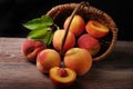 Fresh peaches falling out of a basket Royalty Free Stock Photo