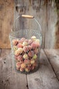 Fresh peaches fruits in basket on dark wooden rustic background, top view. Summer harvest of fruit. Still life. A group of ripe Royalty Free Stock Photo