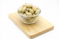 Fresh peanut on glass bowl over white Royalty Free Stock Photo