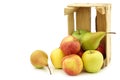 Fresh pears and apples in a wooden crate Royalty Free Stock Photo
