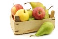 Fresh pears and apples in a wooden crate Royalty Free Stock Photo