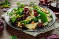 Fresh Pears, Blue Cheese salad with vegetable green mix, Walnuts, red grapes. healthy food Royalty Free Stock Photo