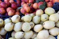 Fresh pears and peaches on the counter of the farmers market. Royalty Free Stock Photo