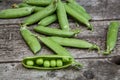 Fresh peas on wood Royalty Free Stock Photo