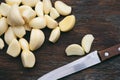 Fresh Peeled Garlic Cloves on old wooden background Royalty Free Stock Photo