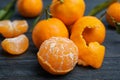 Fresh peeled and whole tangerines