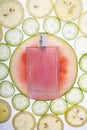 Fresh perfume, juicy fruity, vegetable background with a perfume bottle Royalty Free Stock Photo