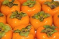 Fresh persimmon fruit food background