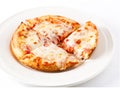 Personal pan cheese pizza in a white plate