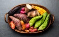 Fresh peruvian Latin American vegetables caigua, sweet potatoes, black corn, camote, yuca