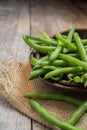 Fresh picked green beans on a wooden table Royalty Free Stock Photo