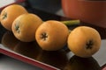 Fresh picked loquats on a Japanese dish