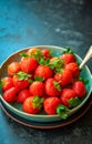 Fresh Picked Strawberries in a Vintage Porcelain Bowl. Summer berries Royalty Free Stock Photo