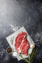 Fresh piece of beef meat on gray background Royalty Free Stock Photo