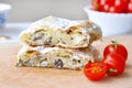 Fresh piece of savory strudel stuffed with chicken meat and mushrooms s